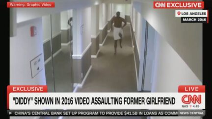 Diddy running down hotel hallway