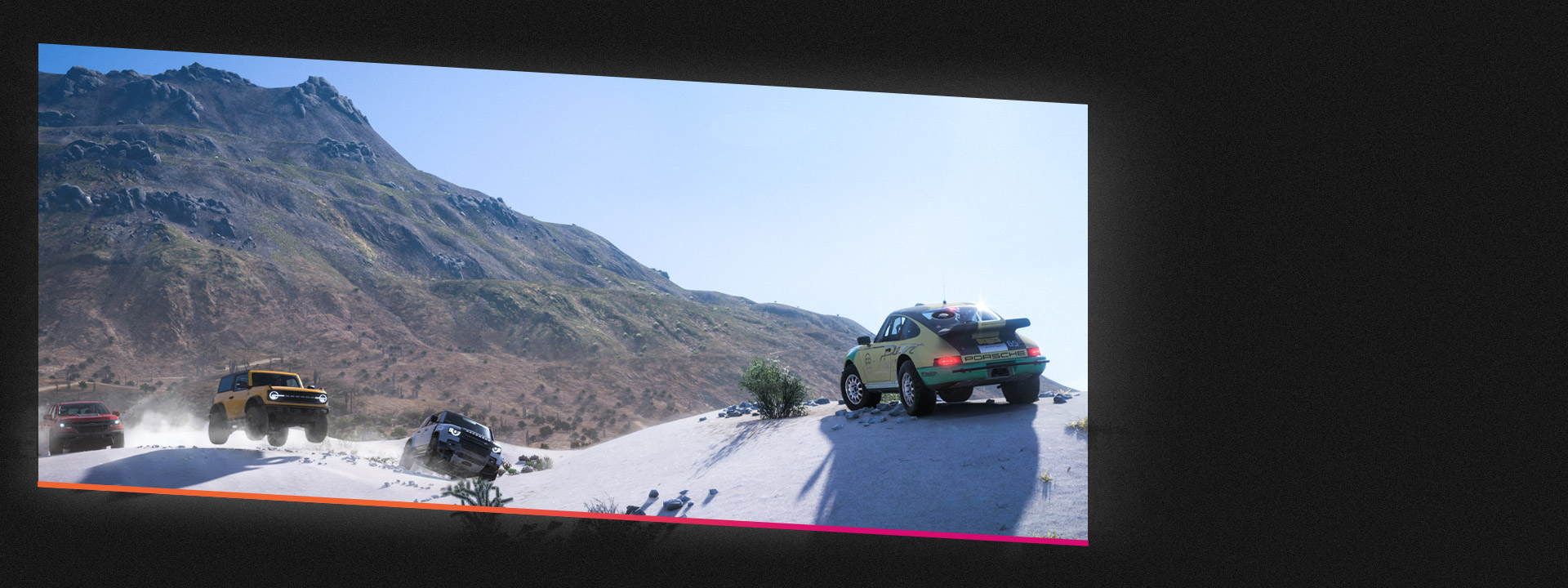 Four cars off-roading in the sand.