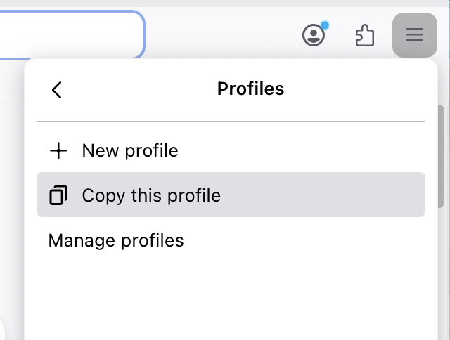 The Firefox profile management menu with three options: “New profile” with a plus icon, “Copy this profile” with a duplicate icon (hovered), and “Manage profiles.”