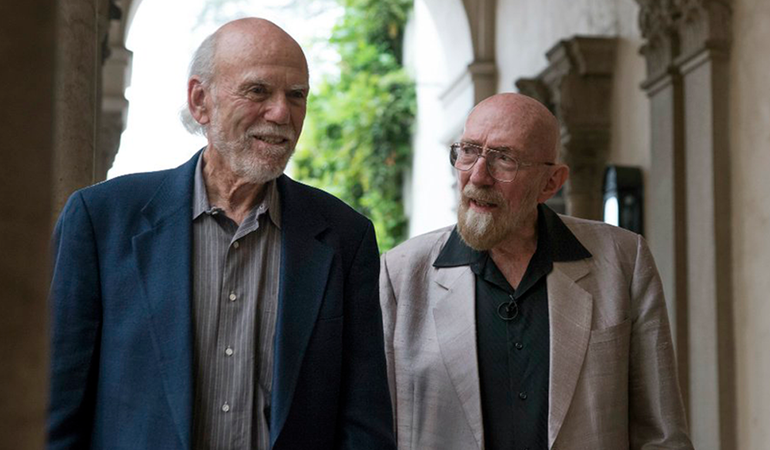 Kip Thorne and Barry Barish standing together on Caltech campus.