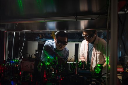 Lihong Wang and another researcher working in the Quantum Lab.