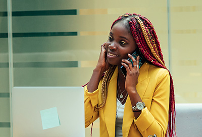 Photo of young woman on the phone