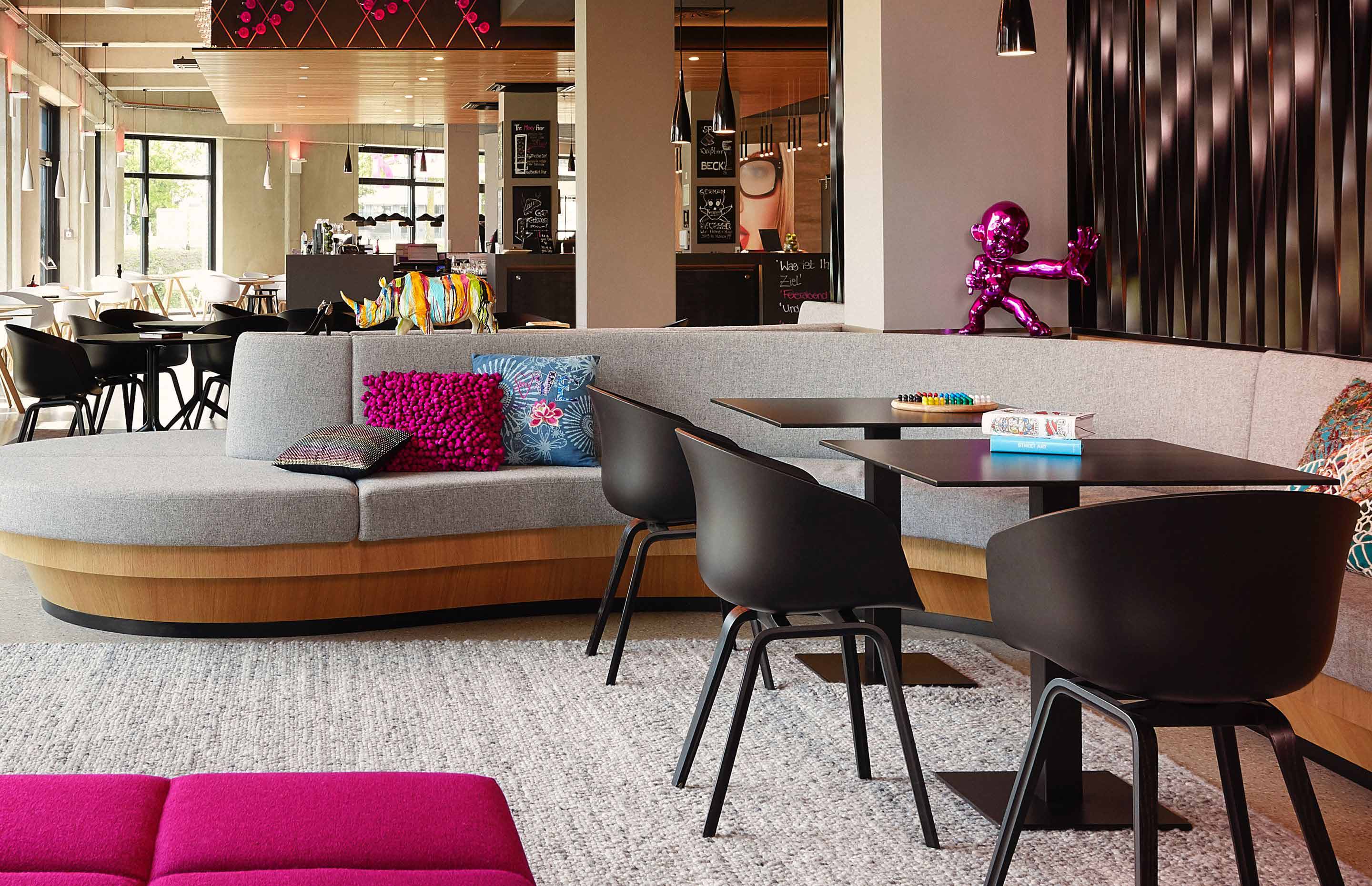 A sleek lobby at a Moxy Hotel