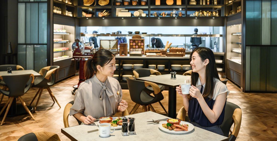 Women enjoying a meal at hotel restaurant