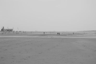 Scenic view of beach against clear sky