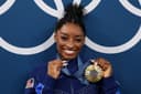 When Simone Biles needed it most, the GOAT came out and cemented a legend