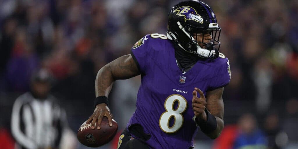 Lamar Jackson challenging Troy Aikman's attempt to trademark shared No. 8