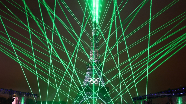 The Eiffel Tower is bathed in green light 