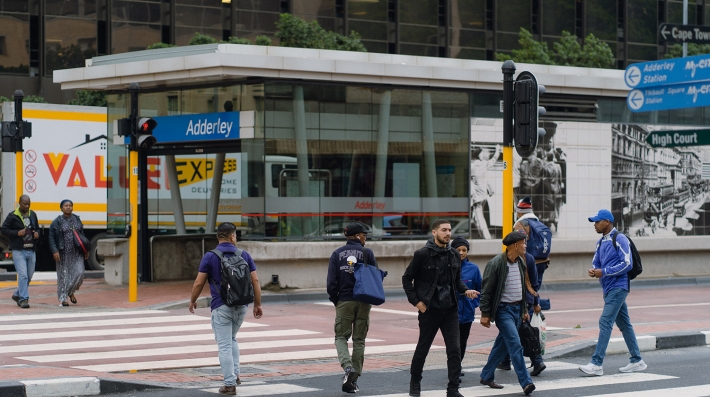 Pedestrians at a crosswalk on Adderley Street, Cape Town