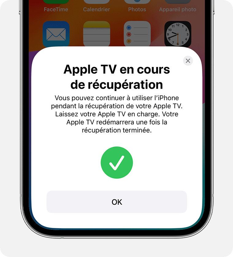 La notification « Apple TV en cours de récupération » s’affiche sur l’iPhone.