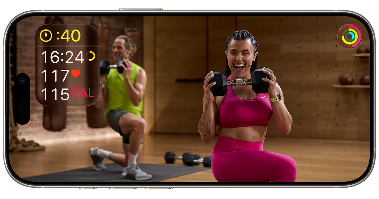 On an iPhone, a Fitness+ workout is shown with metrics displayed onscreen.