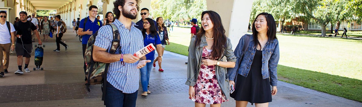 students laughing while walking