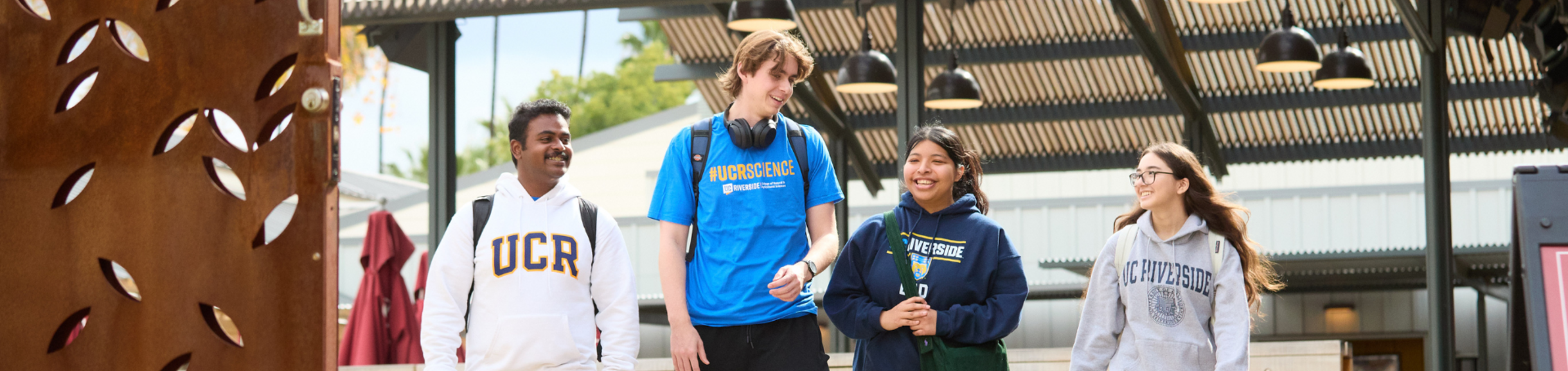 CNAS students walking past The Barn