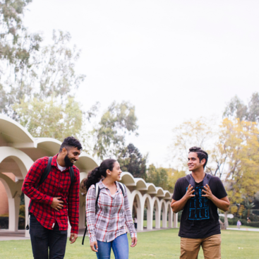 UCR students walking on Rivera lawn