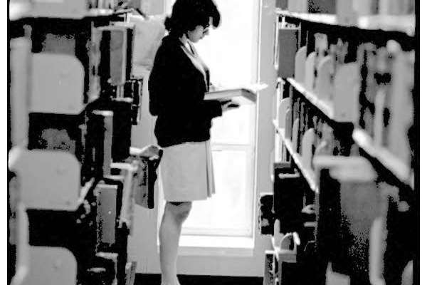 LIBRARY PATRON IN STACKS