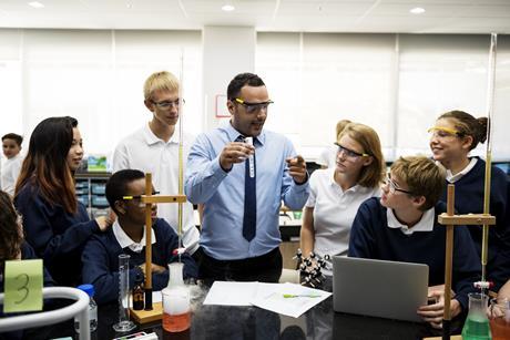 Science teaching doing a demonstration