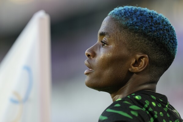 Nigeria's Rasheedat Ajibade looks on during the women's Group C soccer match between Nigeria and Brazil at the Bordeaux stadium during the 2024 Summer Olympics, Thursday, July 25, 2024, in Bordeaux, France. (AP Photo/Moises Castillo)