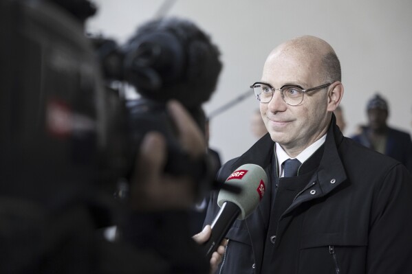 Philippe Currat, lawyer for Gambia's former Interior Minister Ousman Sonko, talks to the media after the conviction of her father, in front of the Federal Criminal Court of Switzerland in Bellinzona, Wednesday, May 15, 2024. Switzerland’s top criminal court has convicted Ousman Sonko for crimes against humanity over the repression by the west African country’s security forces against opponents of its longtime dictator, a legal advocacy group said Wednesday. (Maria Linda Clericetti/Keystone via AP)