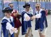 From left, Parisians Mathilde Joannard and Franck Tallieu pose with friends Jakub Mroz and Pawel Czechowicz while taking a break during the fencing competition at the 2024 Summer Olympics at the Grand Palais in Paris, France, Saturday, Aug. 3, 2024. (AP Photo/Jocelyn Noveck)