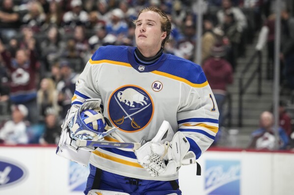 FILE - Buffalo Sabres goaltender Ukko-Pekka Luukkonen (1) in the third period of an NHL hockey game Dec. 13, 2023, in Denver. Lukkonen went from being the Buffalo Sabres’ third-string goalie to start last season to their potential long-term answer in net after agreeing to a five-year, $23.75 million contract on Wednesday, July 24, 2024. (AP Photo/David Zalubowski, File)