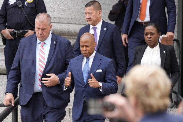 New York City Mayor Eric Adams leaves the Thurgood Marshall United States Courthouse in New York, Wednesday, Oct. 2, 2024. (AP Photo/Pamela Smith)