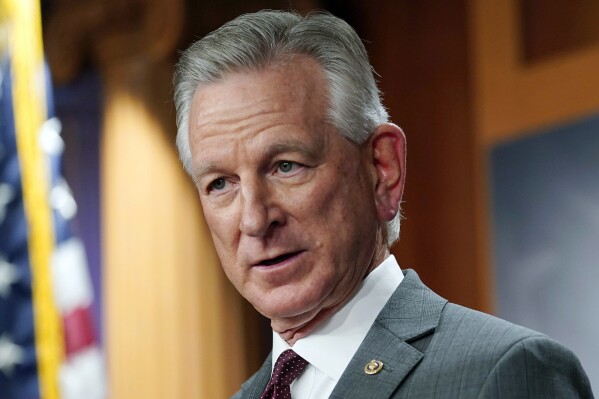 FILE - Sen. Tommy Tuberville, R-Ala., listens to a question during a news conference, March 30, 2022, in Washington. Tuberville is blocking the quick promotion of an aide to Defense Secretary Lloyd Austin. Tuberville is blocking the nomination of Lt. Gen Ron Clark over concerns that he and other senior staff did not quickly notify President Joe Biden when Austin was hospitalized with complications from cancer treatment earlier this year. (AP Photo/Mariam Zuhaib, File)