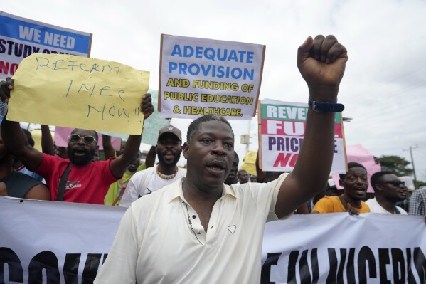 People protest against the economic hardship on the street in Lagos, Nigeria, Friday, Aug 2, 2024. (AP Photo/Sunday Alamba)