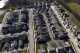 FILE - This aerial photo shows a housing development in Cranberry Township, Pa., March 29, 2024. (AP Photo/Gene J. Puskar, File)