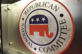 FILE - The Republican National Committee logo is shown on the stage at the North Charleston Coliseum, Jan. 13, 2016, in North Charleston, S.C. The Republican National Committee’s Washington headquarters was briefly evacuated on Wednesday as police investigated vials of blood that had been addressed to former President Donald Trump, the party’s presumptive presidential nominee. (AP Photo/Rainier Ehrhardt, File)