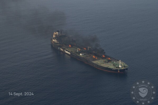 This photo released by the European Union's Operation Aspides naval force shows the oil tanker Sounion burning in the Red Sea following a series of attacks by Yemen's Houthi rebels, on Saturday Sept. 14, 2024. (European Union's Operation Aspides via AP)