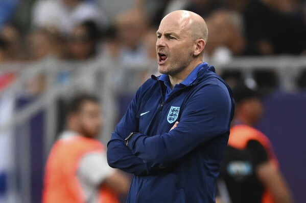 FILE - England's head coach Lee Carsley directs his players during the Euro 2023 U21 Championship semifinal soccer match between Israel and England at the Batumi Arena stadium in Batumi, Georgia, Wednesday, July 5, 2023.(AP Photo/Tamuna Kulumbegashvili, File)