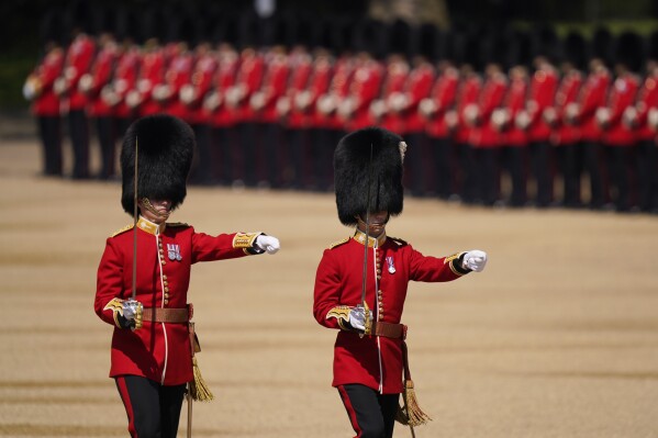 FILE - Soldiers attend the Colonel's Review, the final rehearsal of the Trooping the Colour, the King's annual birthday parade, at Horse Guards Parade in London, Saturday, June 10, 2023. (AP Photo/Alberto Pezzali, File)