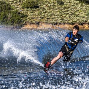 A man with one arm and one leg water skis on the Jordanelle in Park City, Utah.