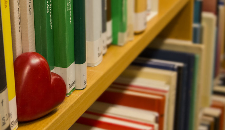 books and a heart in a shelf