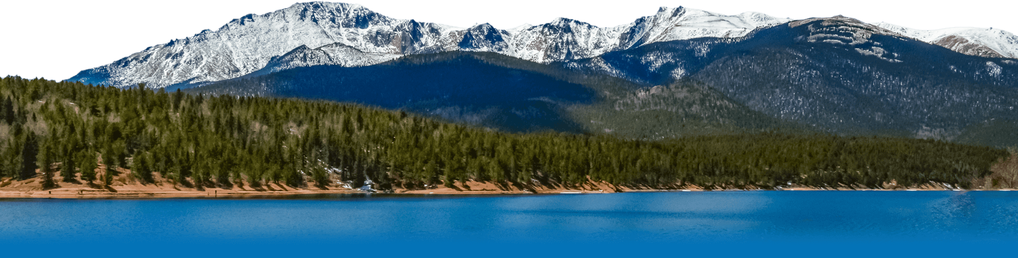 Snow capped mountains with a lake in the valley.