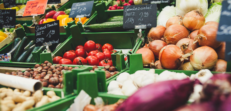 Fresh produce fills baskets at a market