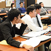 Three students at desk