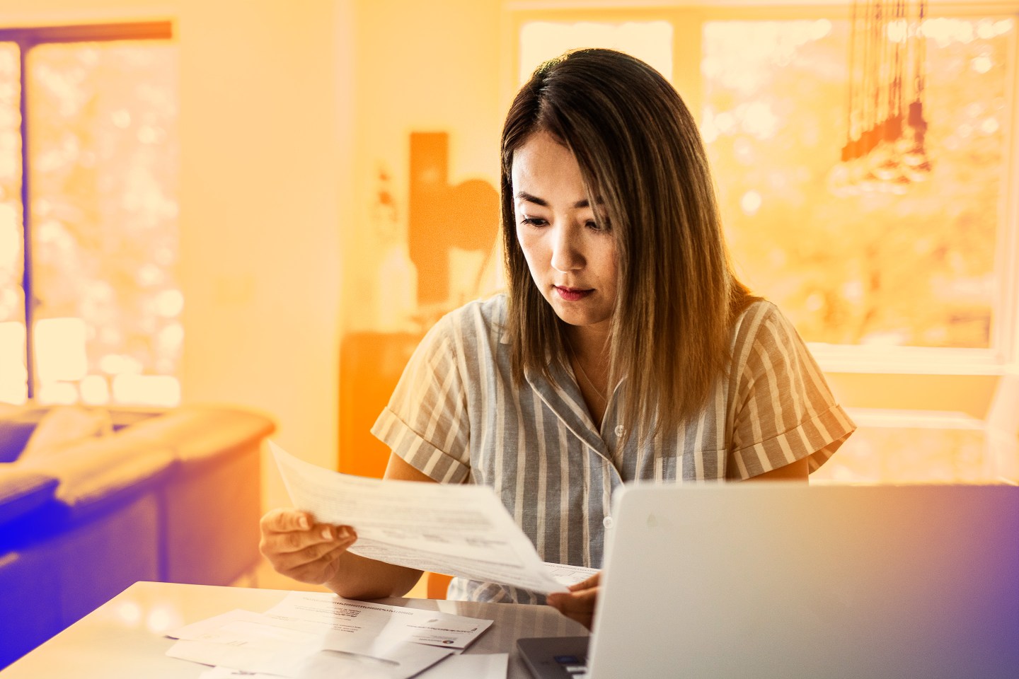 Woman checking financial records