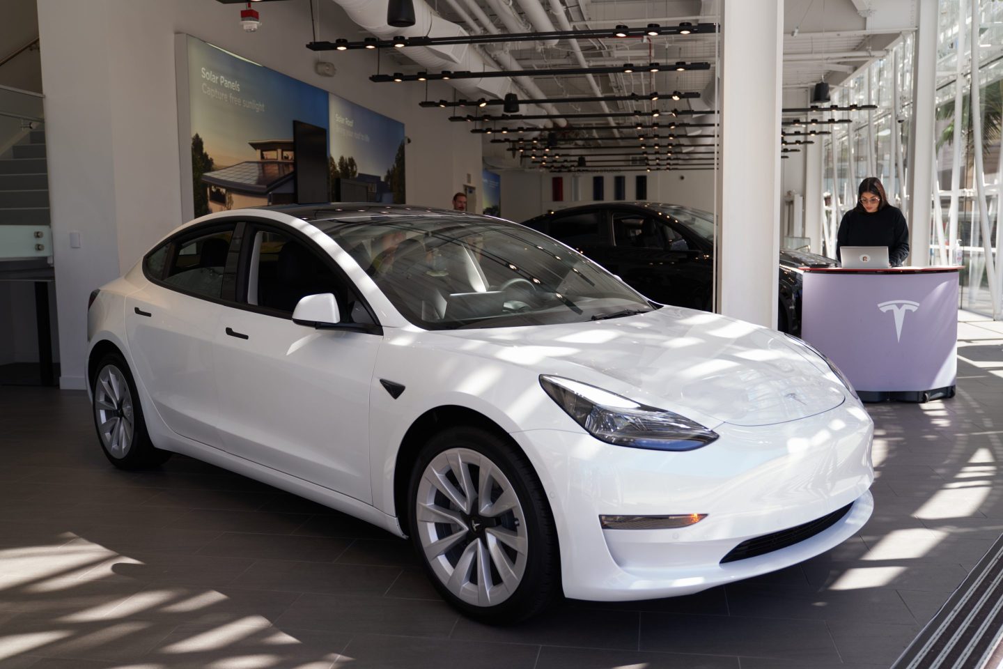 A Tesla Model 3 in a Tesla store in California