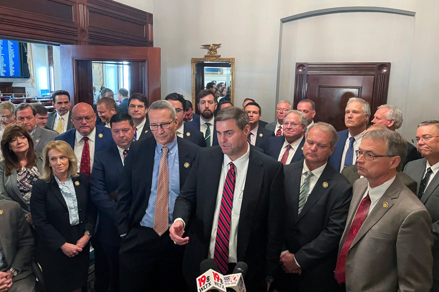 South Carolina House lawmakers celebrate the passage of a bill establishing criminal penalties for trafficking in fentanyl on Feb. 1, 2023 in Columbia, S.C. State lawmakers across the nation are responding to the deadliest overdose crisis in U.S. history by pushing harsher penalties for possessing fentanyl. (AP Photo/James Pollard)