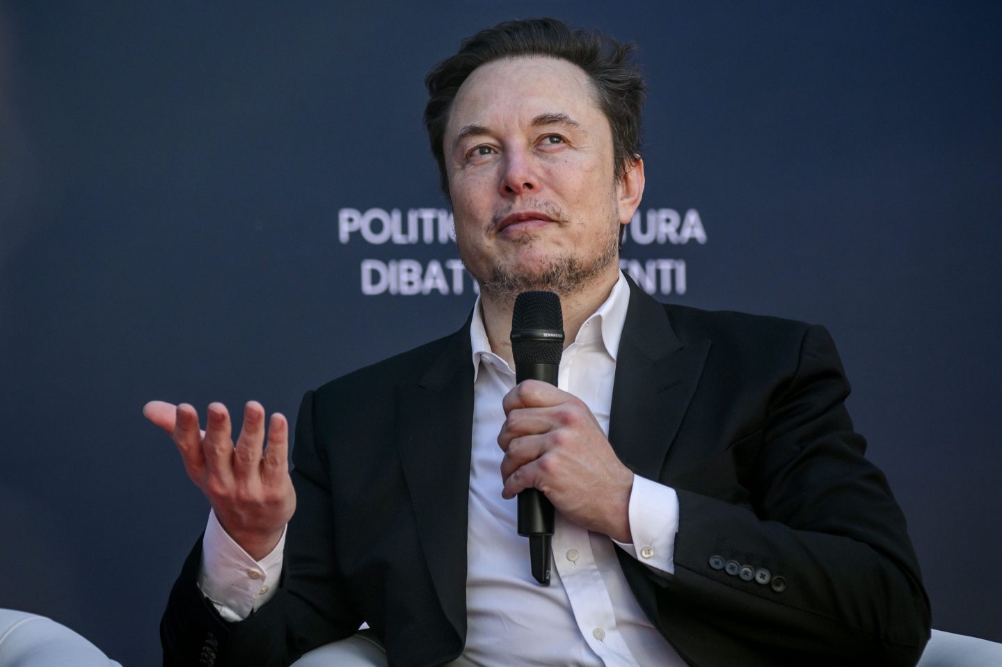 ROME, ITALY &#8211; DECEMBER 15: Elon Musk, chief executive officer of Tesla Inc and X (formerly Twitter) Ceo speaks at the Atreju political convention organized by Fratelli d&#8217;Italia (Brothers of Italy), on December 15, 2023 in Rome, Italy. Italian Prime Minister Giorgia Meloni&#8217;s right-wing political party organised a four-day political festival in the Italian capital. (Photo by Antonio Masiello/Getty Images)