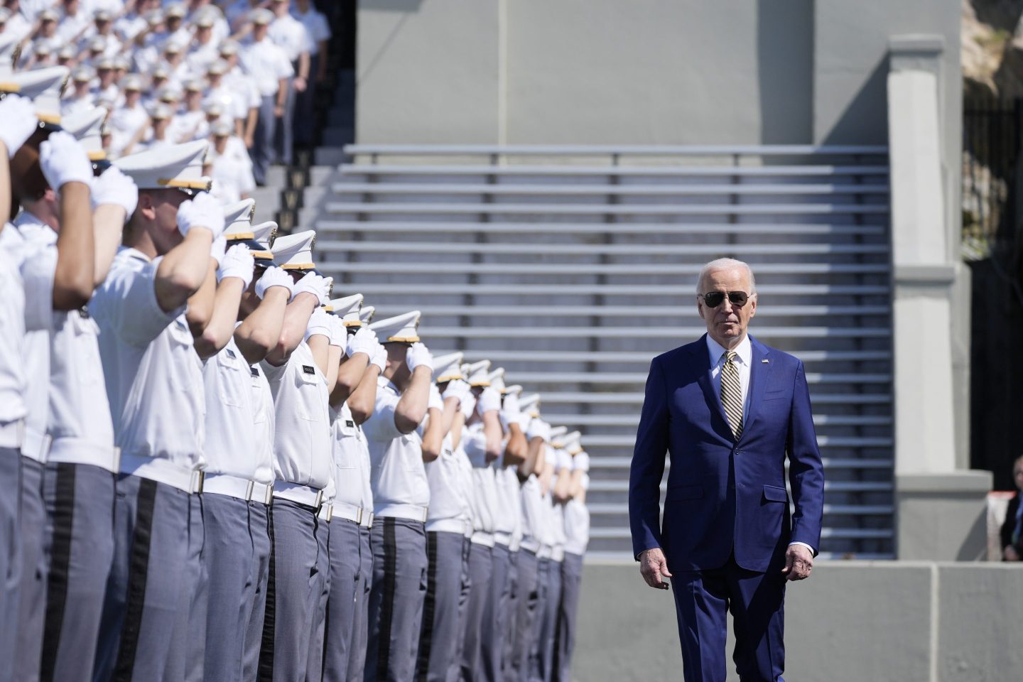 Joe Biden walks past West Point cadets