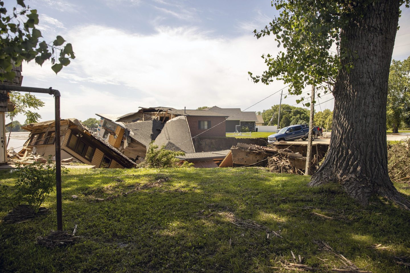 Flooding from the Big Sioux River damage buildings in North Sioux City, S.D., on Monday, June 24, 2024. (AP Photo/Josh Jurgens)