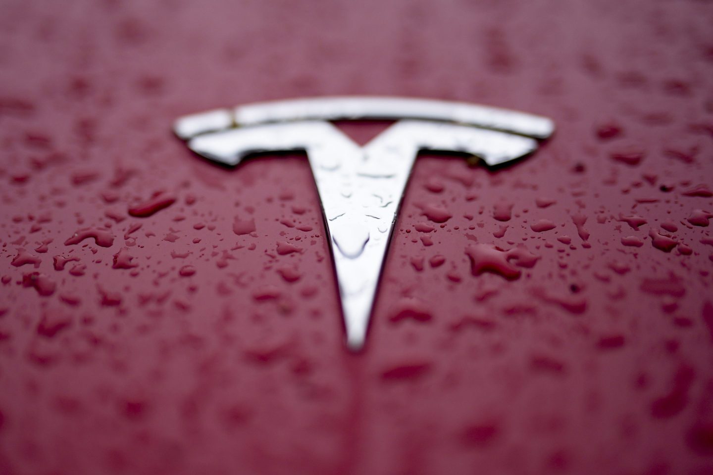 FILE &#8211; A Tesla logo is shown on Feb. 27, 2024, in Charlotte, N.C. Authorities in Washington announced Tuesday, July 30 that the Tesla that hit and killed a motorcyclist near Seattle in April was operating on the company’s “Full Self Driving” system. (AP Photo/Chris Carlson, File)