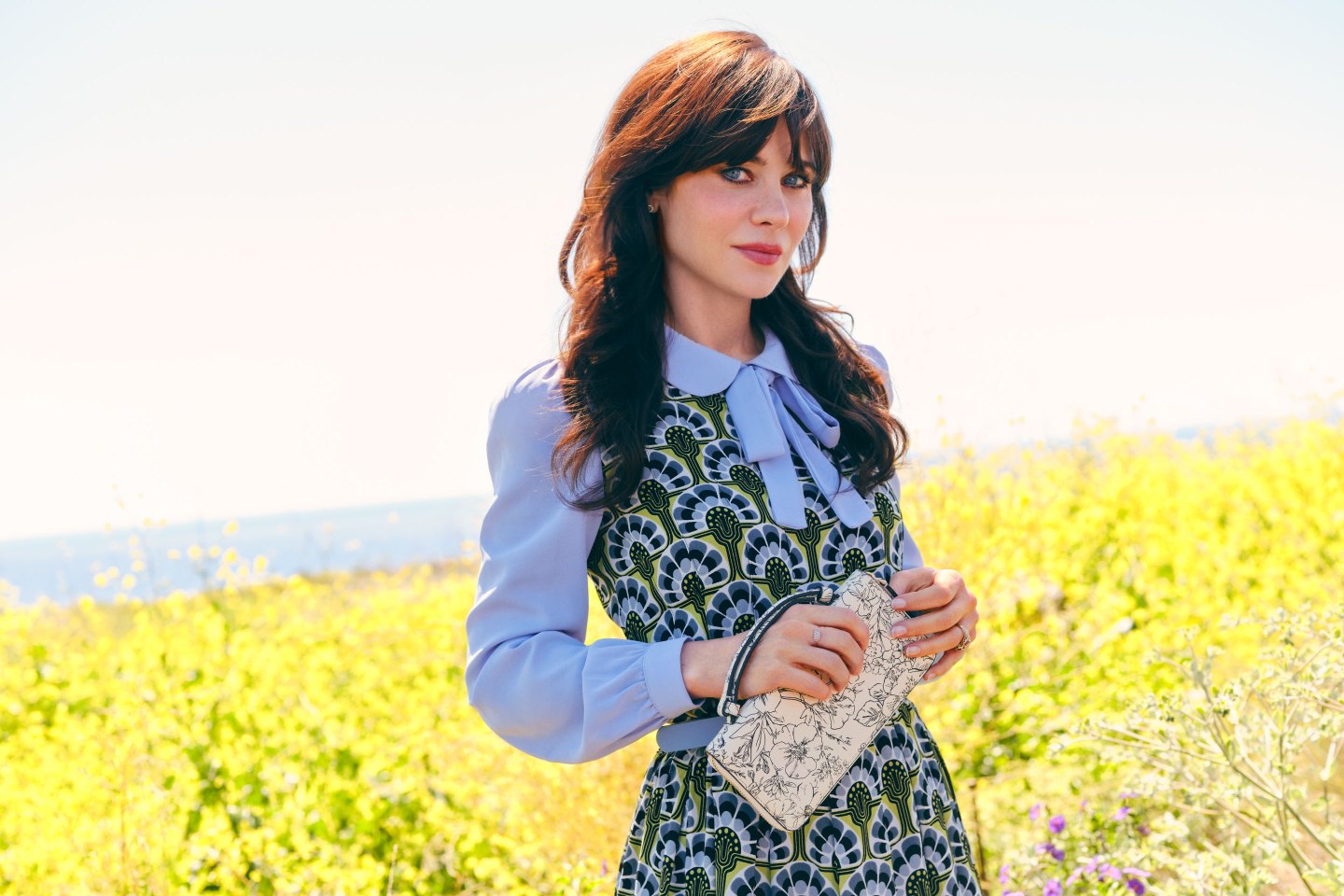 Actor Zooey Deschanel is the new spokesperson for quilted bag brand Vera Bradley as it attempts a comeback.