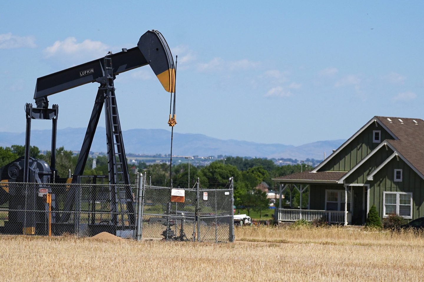 Oil pump next to a house