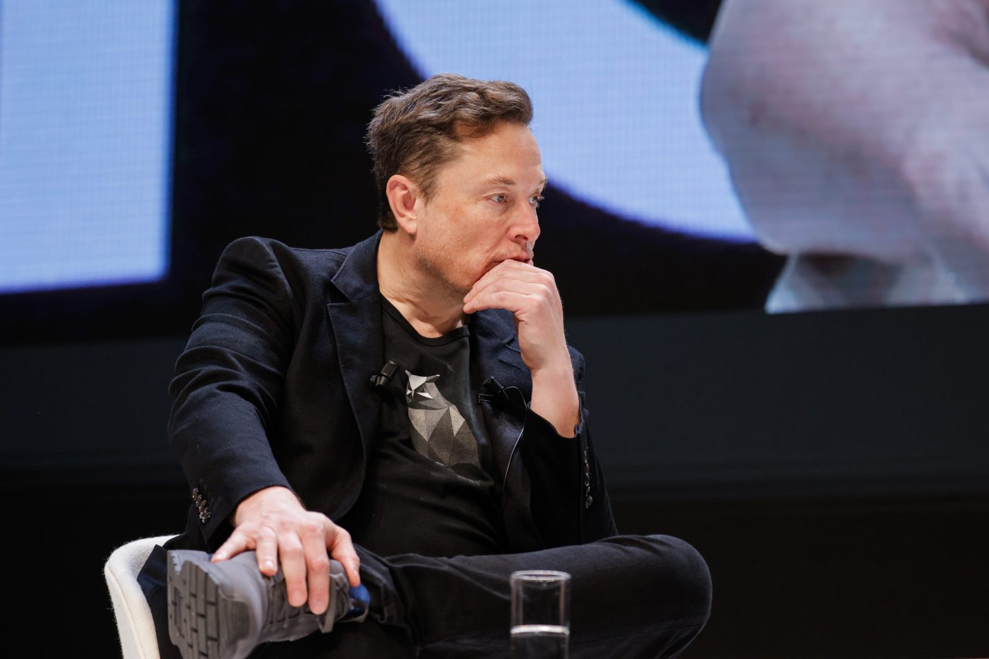 Elon Musk sits at the Cannes Lions festival in France in June.