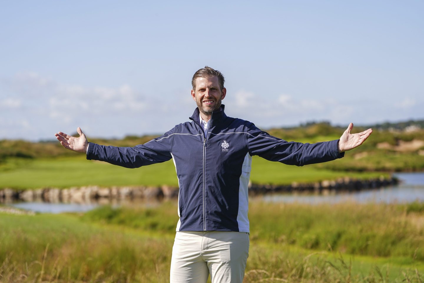 BALMEDIE, SCOTLAND - AUGUST 3: Eric Trump, son of Donald Trump, poses for photos at Trump International Golf Links on August 3, 2024 in Balmedie, Scotland. Eric Trump is in Aberdeenshire to preview the new golf course at Trump International Golf Links which officially opens in Summer 2025.  (Photo by Peter Summers/Getty Images)