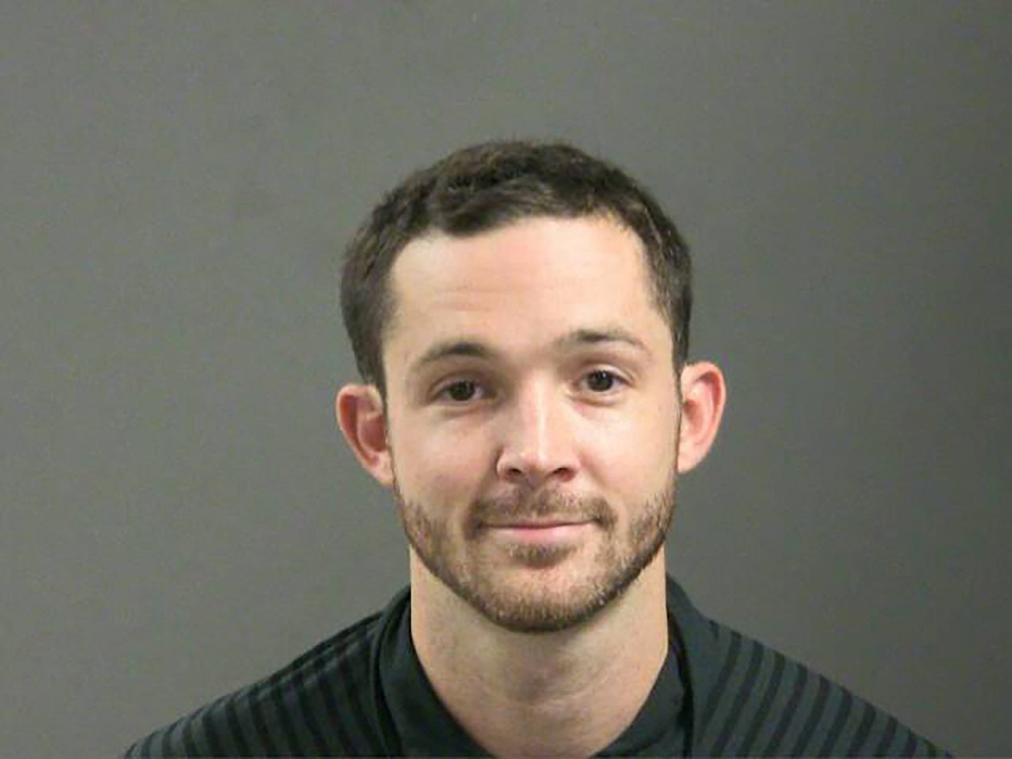 Police mugshot of Tyson chief financial officer John R. Tyson