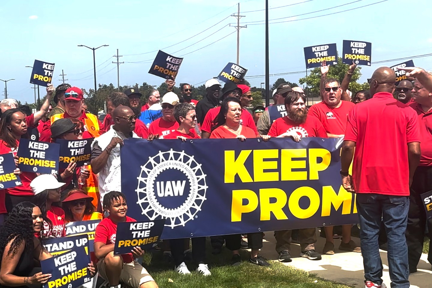 In this image from video, United Auto Workers members rally outside Stellantis&#8217; Sterling Heights Assembly Plant Friday, Aug. 23, 2024, in Sterling Heights, Mich. (AP Photo/Tom Krisher)